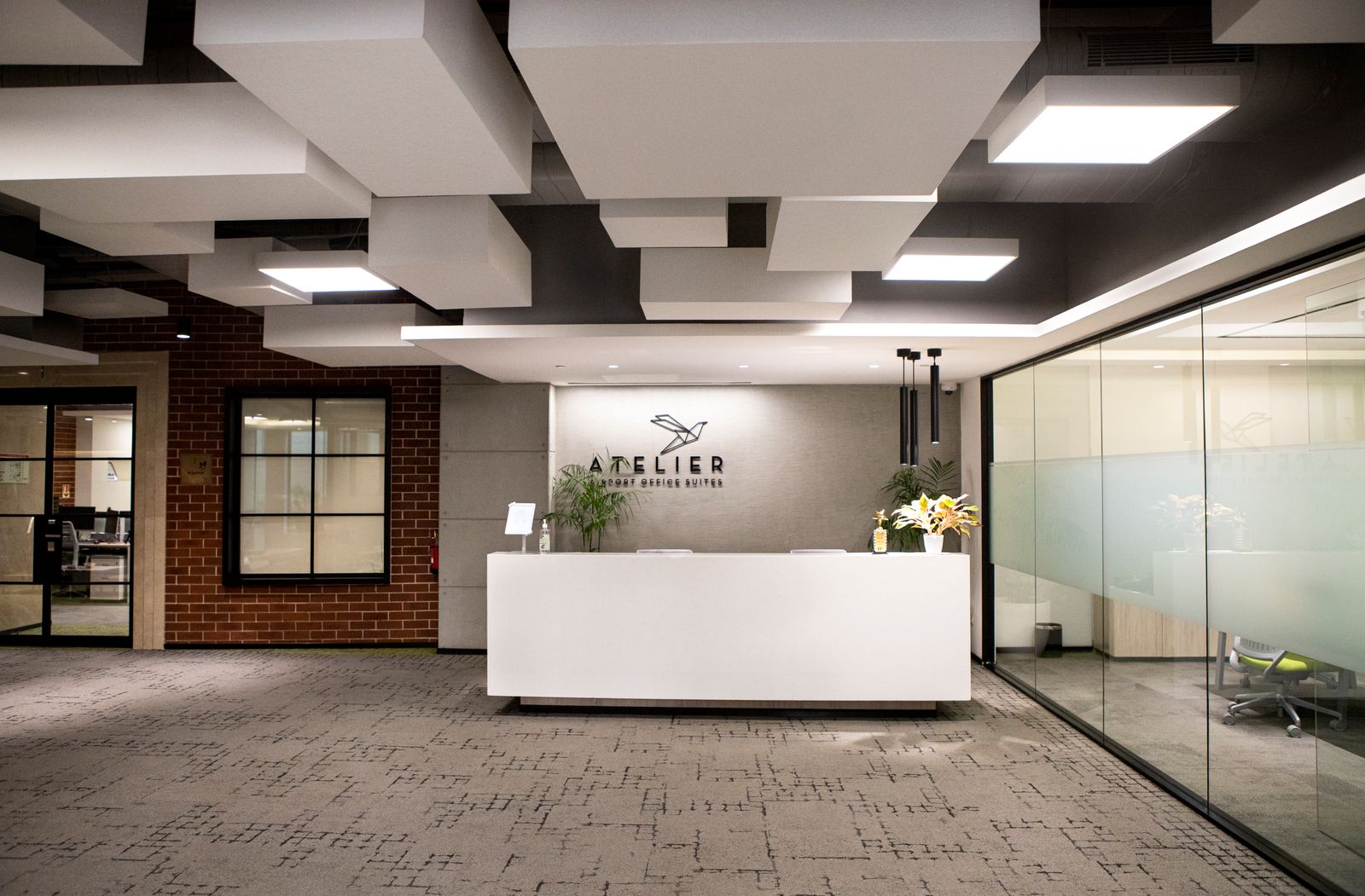 Suburban brokerage office interior with meeting space